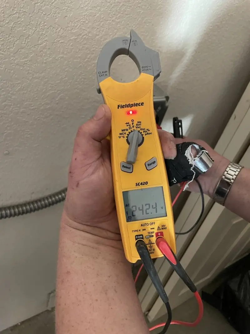 Voltage testing with clamp meter during Electrical Installation Services in Fountain Hills